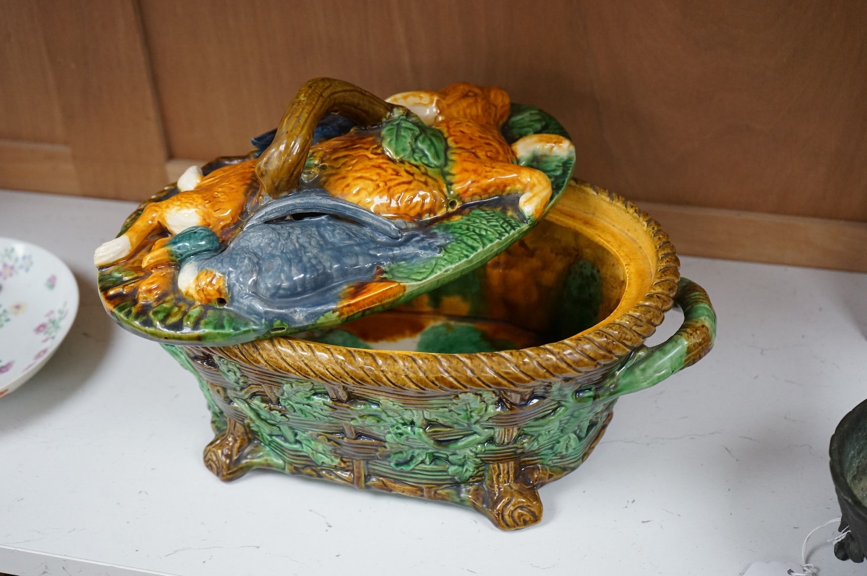 A majolica style game pie dish, 37cm wide
